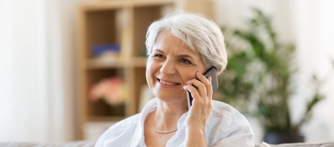 Senior woman smiling and talking on phone